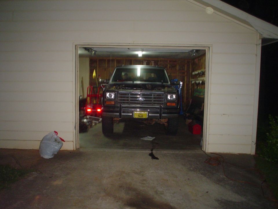 Front view of a 1981 Ford Bronco in a garage