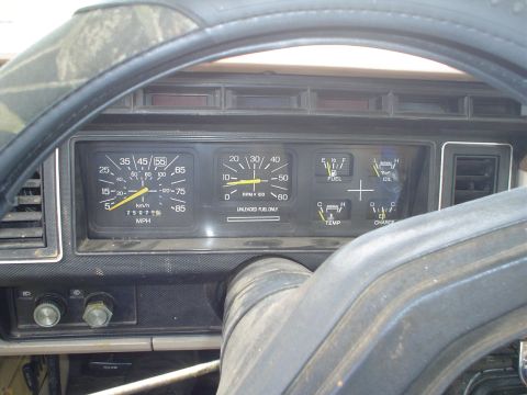 1981 Ford Bronco - Interior view of a 1981 Ford Bronco dashboard, the instrument cluster with multiple gauges.