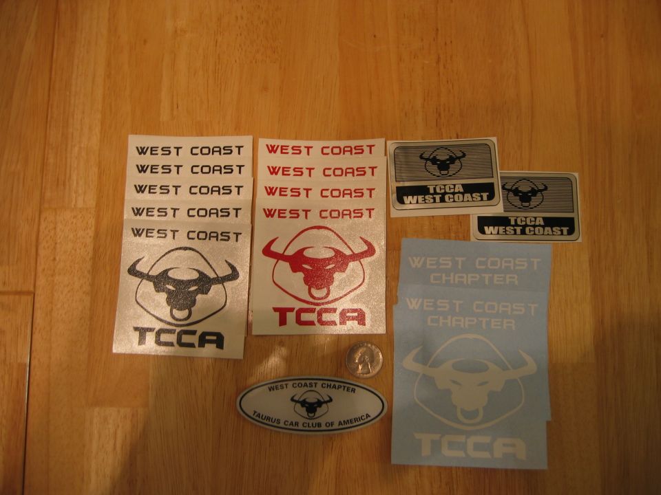 Collection of car club decals with bull logos and text like "WEST COAST" and "TCCA"