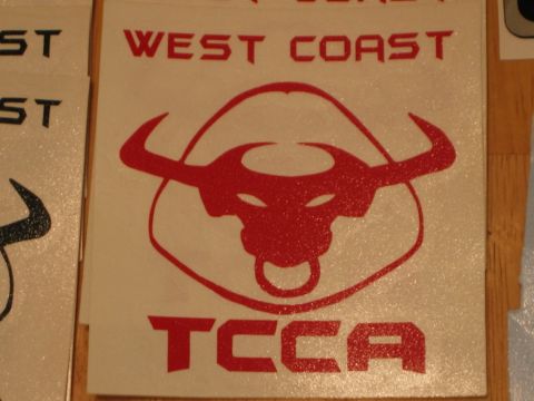 2002 Ford Taurus - Decal shows a bull's head logo with 'WEST COAST' and 'TCCA' text.