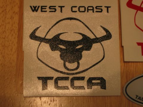 2002 Ford Taurus - A sticker a bull's head logo with the text 'WEST COAST TCCA' is shown.