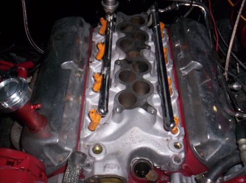 1989 Ford Bronco II - Close-up view of an engine's intake manifold and fuel injection system.