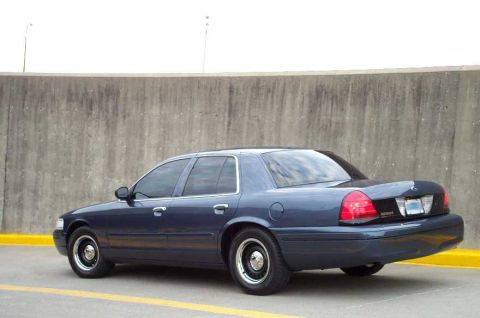 1998 Ford Crown Victoria - This 1998 Ford Crown Victoria is shown from the rear 3/4 angle.