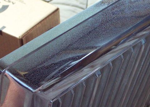 1985 Ford LTD Crown Victoria - Close-up view of a chrome grille section with a speckled metallic finish.
