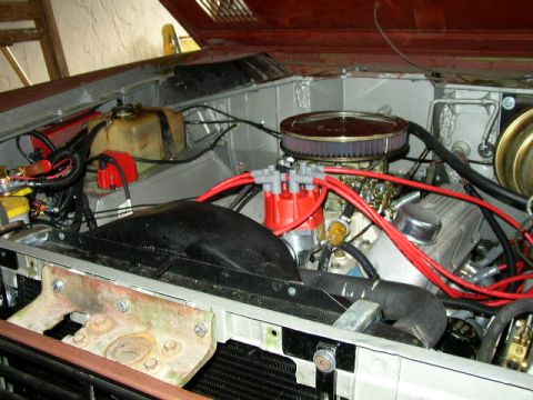 1995 Ford Bronco - Close-up view of the engine compartment, showing various components and wiring.