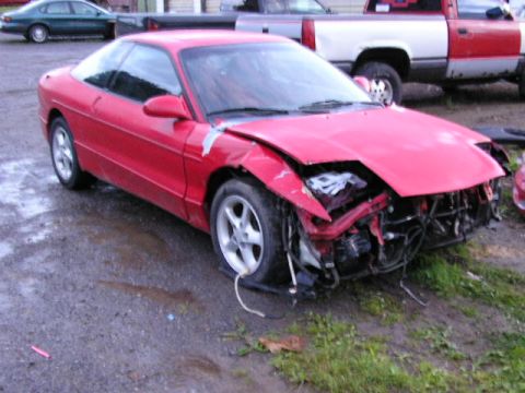 1994 Ford Probe - Damaged 1994 Ford Probe shows extensive front-end collision damage.