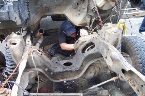 1985 Ford F-150 - removing the mounts for the motor... need to add them to the cross member on the new truck as the 6 cyl was mounted in the middle of the cr…