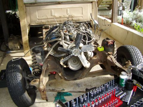 1985 Ford F-150 - motor mounts are in... test mounting the motor...
