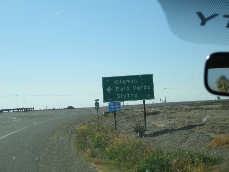 Green highway signs point to Glamis, Palo Verde, and Blythe