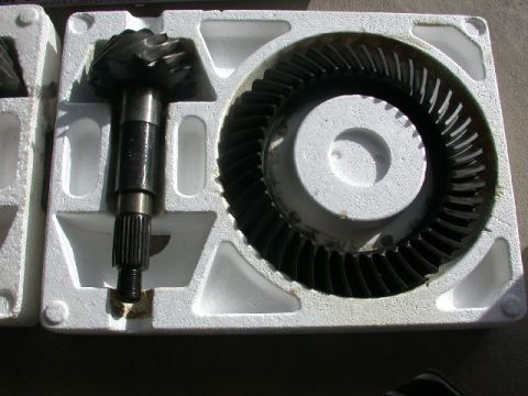 1994 Ford Bronco - Differential gears, a ring gear and pinion, are shown packaged for transport.
