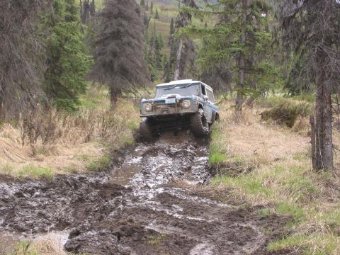 1985 Ford Bronco - Dave attempting a big hump in the trail. It's short so either a tall rig or some wheel base helps here. He ended up getting high centered a…
