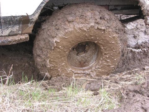 1985 Ford Bronco - My Tires after going through the same hole Rick went through.