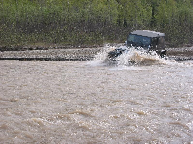 Rick diving into one of many deep water crossings.
