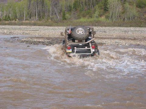1985 Ford Bronco - Greg again going through another deep river crossing. This time with no problems at all.