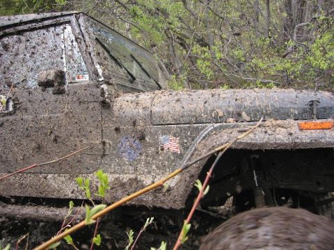 1985 Ford Bronco - Rick made it out of the mud pit. But in the course of it he almost ran us all over. Noone expected him to make it. This picture was taken r…