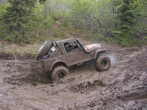 1985 Ford Bronco - Greg attempting the Last mud pit before the trail head. He was unsuccessful as wes all of us but RIck.