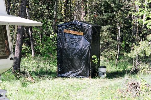 1990 Ford Bronco - Campground 9-the portable outhouse