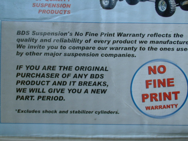 BDS Suspension packaging with No Fine Print Warranty statement and red and blue badge