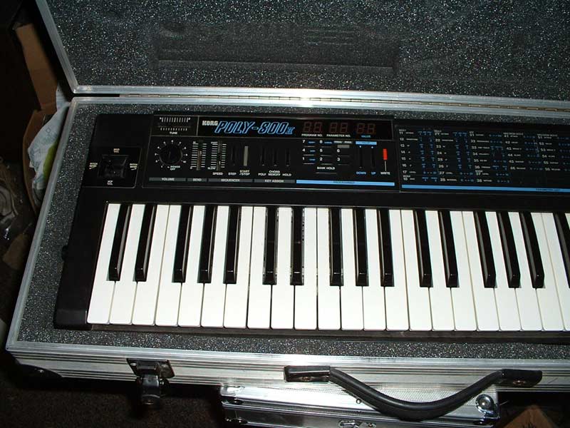Korg Poly-800 synthesizer in a case