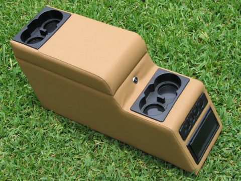 2000 Ford Crown Victoria - This tan center console features dual cup holders and a lockable storage compartment, designed for aftermarket installation.