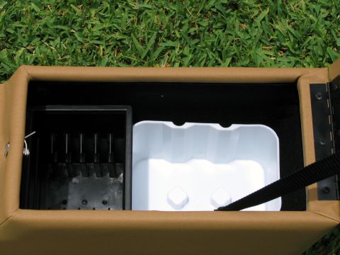 2000 Ford Crown Victoria - Interior view of a car's center console organizer with a cup holder insert and a tray for items.