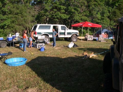 1999 Jeep TJ - A group camping with a Ford Bronco and a Jeep Wrangler, enjoying an outdoor gathering.