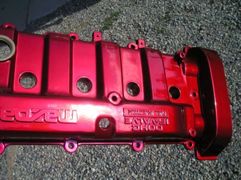 1994 Ford Probe - Engine valve cover painted red, showing 'Mazda' and '16-VALVE FUEL INJECTION' text.