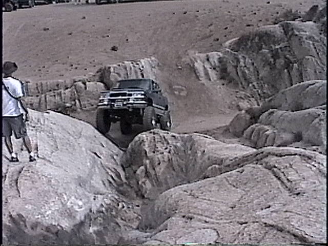 1997 Chevrolet C/K Pickup climbing rocky terrain