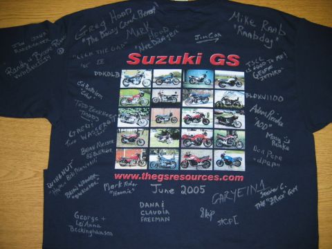 1985 Ford LTD Crown Victoria - A dark t-shirt displays a collage of Suzuki GS motorcycle images and numerous handwritten signatures and names.