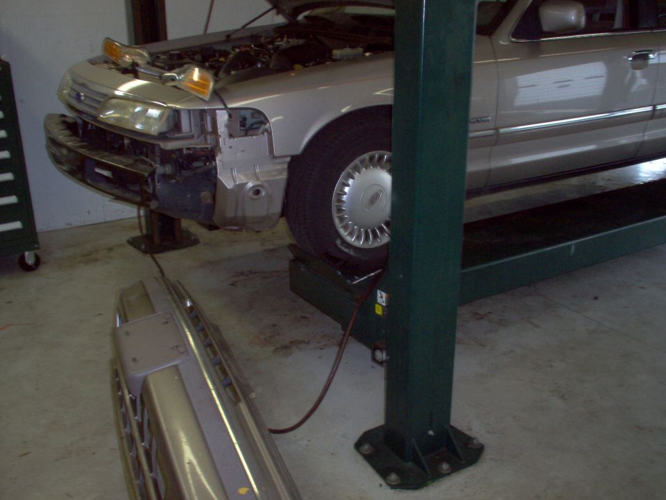 Pulling the bumper cover is fairly easy, but there are 4 tabs under the grille & headlights that have to be pried up to release it.