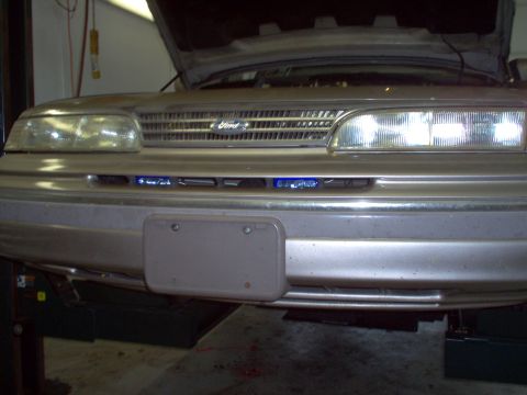 1994 Ford Crown Victoria - Even though they're partially blocked, they still put out a lot of light. Normally, they're not as obvious as they look in this photo.