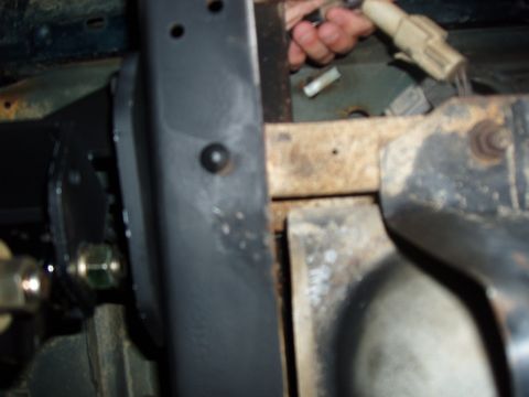 1994 Ford Bronco - Detail of vehicle frame and electrical connections, likely from an older model.