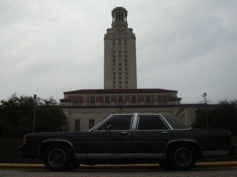 1988 Ford Crown Victoria LTD - Side view of a 1988 Ford Crown Victoria LTD parked in front of the University of Texas Tower.