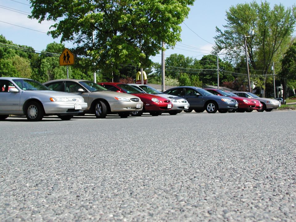 Silver 1992 Ford Taurus parked in a line of sedans