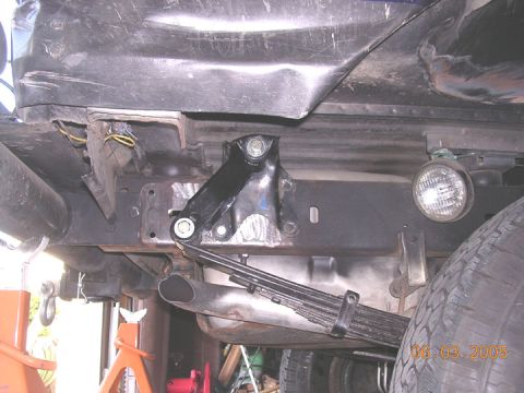 1994 Ford Bronco - this is the drivers side stock hanger on the pass side (and vice versa for the previous pic) the holes are a little off, o the hanger is cr…
