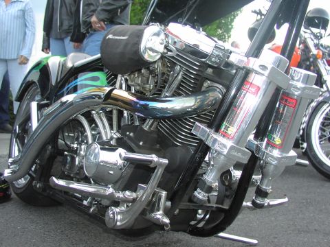 1979 Ford Bronco - Close-up view of a custom motorcycle's engine and front suspension system.