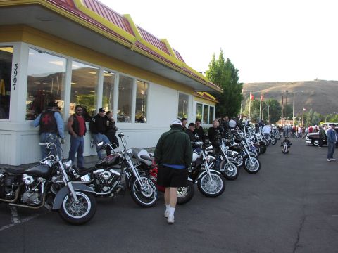 1979 Ford Bronco - A group of people and motorcycles gathered outside a McDonald's restaurant.