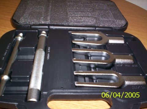 1994 Ford Probe - A tie rod separator tool kit is shown in its case, with multiple forks visible.