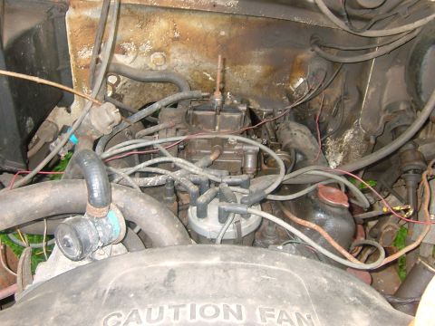 1984 Ford Bronco - Close-up view of an engine bay, showing various components and wiring. wiring.