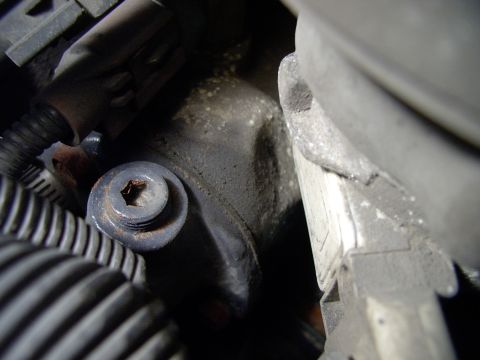 1986 Ford Bronco - This is where I stuck the sensor for the fan controller. As luck would have it my off-shore cast iron T-stat housing had the exact provisio…