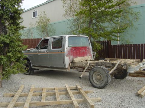 1986 Ford F-150 - This Ford F-Series truck is missing its bed and appears to be undergoing repairs or modifications.