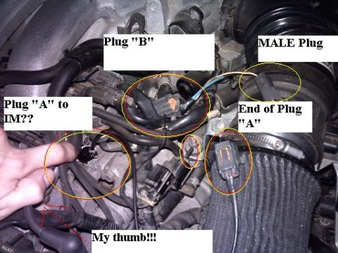 1995 Ford Probe - Close-up view of engine bay components with various electrical connectors labeled.