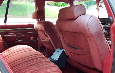 1985 Ford LTD Crown Victoria - Interior view of a 1985 Ford Crown Victoria LTD, showing the front and rear seats.