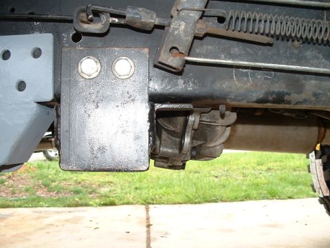 1995 Ford Bronco - Undercarriage view of a vehicle, highlighting suspension and drivetrain components.