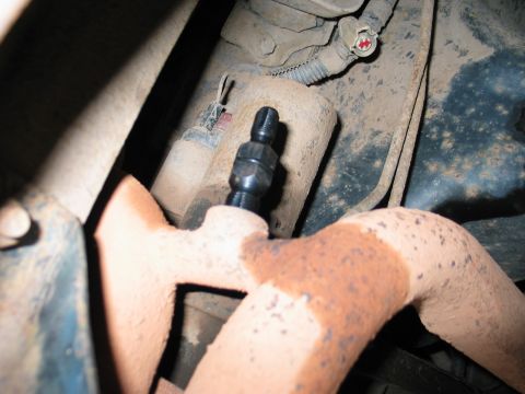 1995 Ford Bronco - This image shows an exhaust manifold with a sensor, not a 1995 Ford Bronco.