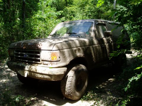 1990 Ford Bronco - This 1990 Ford Bronco is covered in mud after an off-road excursion.