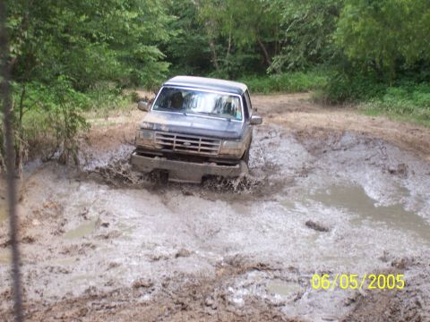 1987 Ford Bronco - This 1987 Ford Bronco navigates a muddy obstacle course.