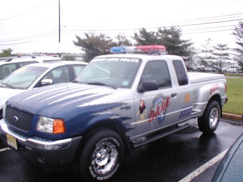 1979 Ford Bronco - This Ford Ranger pickup truck is marked as a police vehicle for the DARE program.