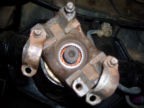 1994 Ford Bronco - Close-up view of a vehicle's driveshaft u-joint, showing the splined connection.