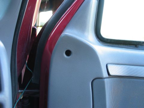 1995 Ford Bronco - Interior door panel detail with visible wiring near the door jamb.